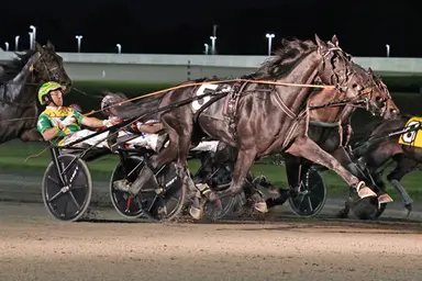Yonkers:  Inexpressable vaults off cover to MGM Yonkers Trot title