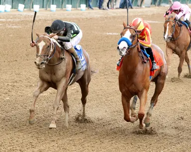 Usha hangs on over late-running Zeitlos to take Winning Colors