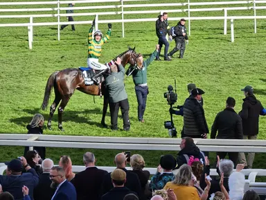 Aintree: I Am Maximus overcomes high weight for historic Grand National win
