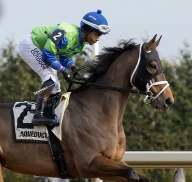 Wet track, fast pace favors Full Moon Madness in John Nerud