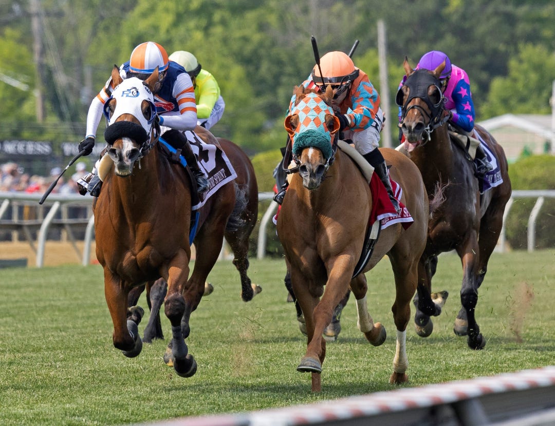 Beer Can Man (left) beats Nothing Better in the Jim McKay Turf Sprint at PIM May 20 2023