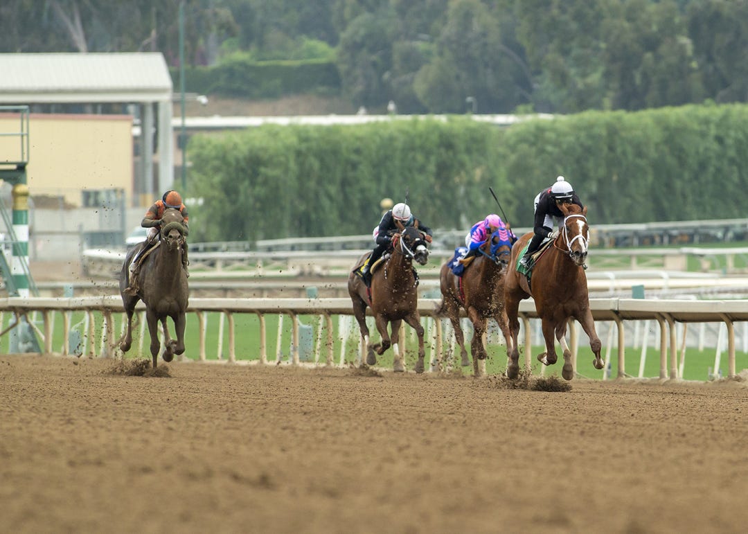 The Chosen Vron draws away in the Thor's Echo Stakes on Sunday at Santa Anita. Brickyard Ride, along the rail, was dueled into defeat and faded to third in the four-horse field.