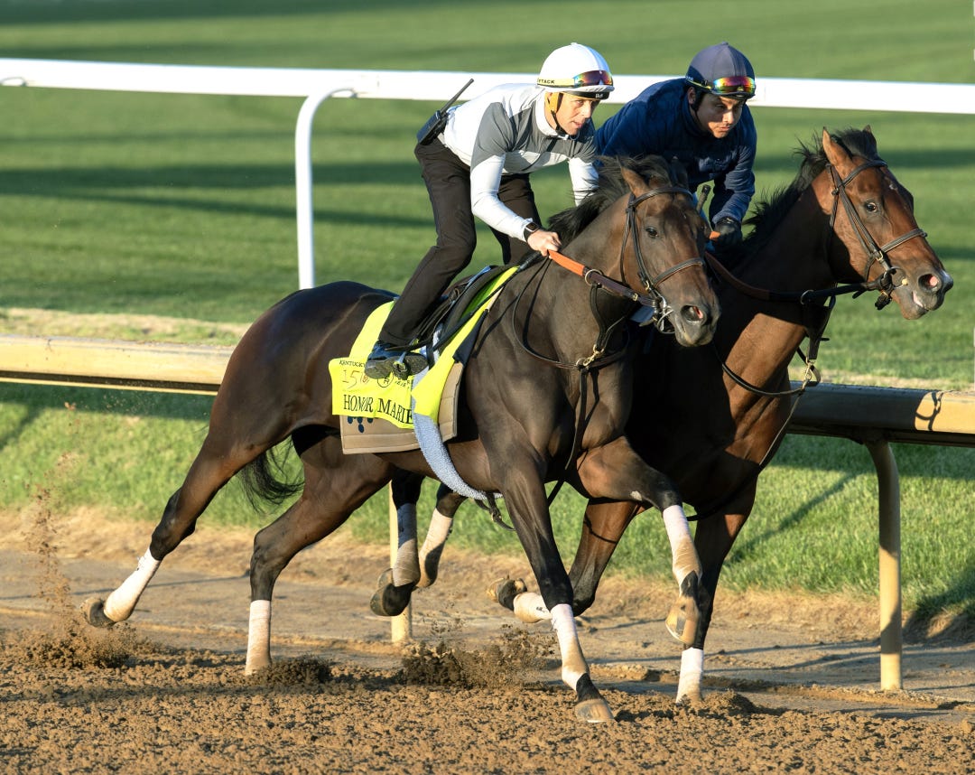 Honor Marie (foreground) works with Agoo at CD April 25 2024