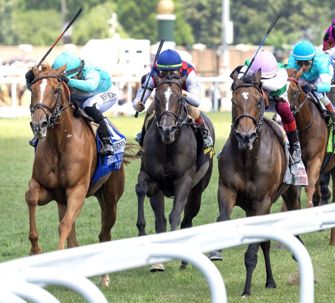 Chili Flag (left) wins Distaff Turf Mile over Coppice (right) and Delahaye at CD May 4 2024